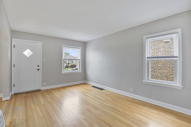 6000 S Mayfield Ave, Chicago, IL 60638 - entrance foyer with baseboards and light wood-style floors