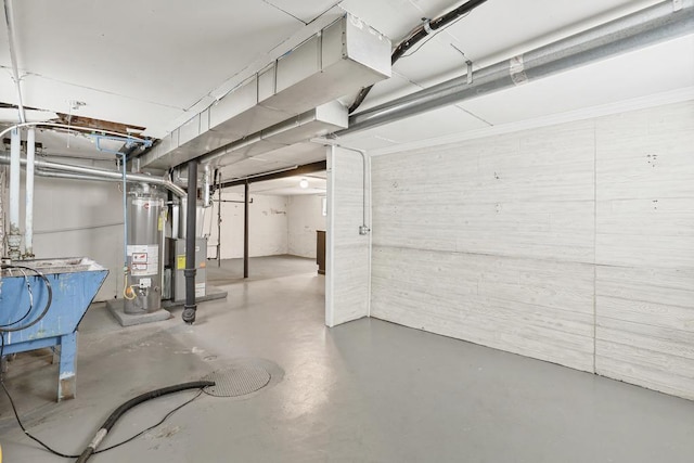 6000 S Mayfield Ave, Chicago, IL 60638 - unfinished below grade area featuring water heater
