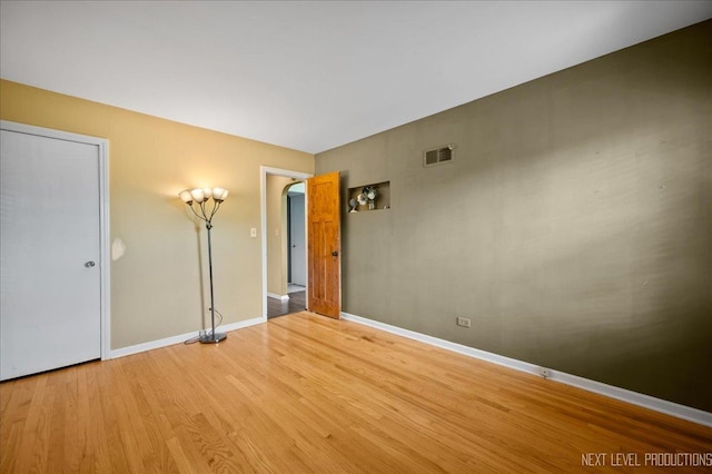 680 N Grace St, Lombard, IL 60148 - spare room with wood finished floors and baseboards