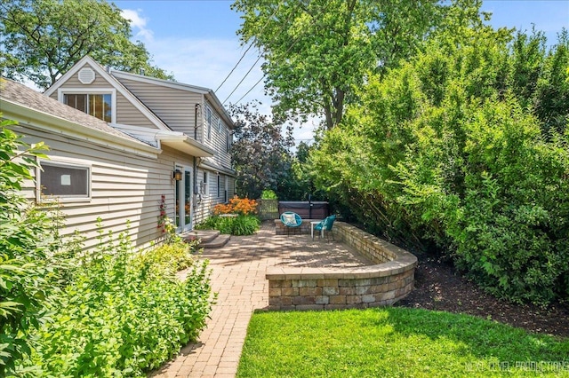 680 N Grace St, Lombard, IL 60148 - view of yard with a hot tub and a patio