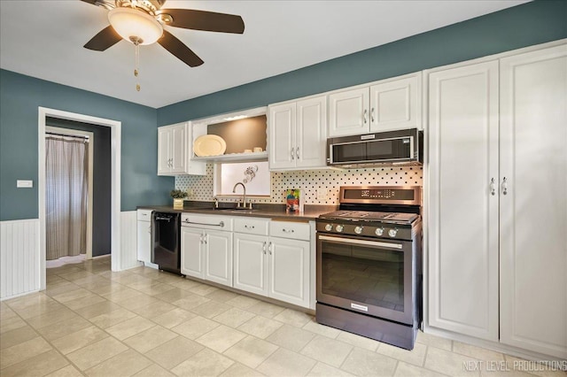 680 N Grace St, Lombard, IL 60148 - kitchen featuring stainless steel gas range, black dishwasher, dark countertops, white cabinets, and backsplash