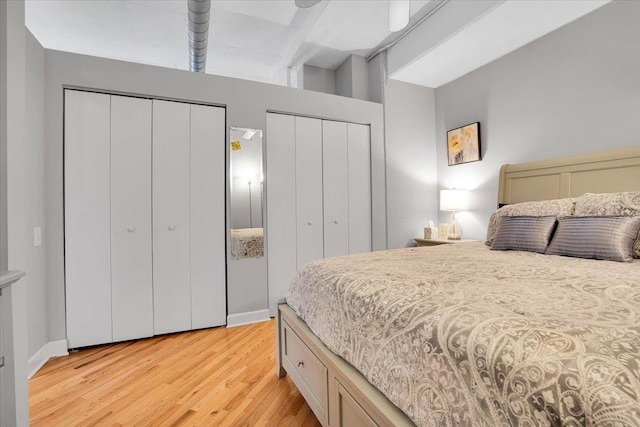 500 S Clinton St Unit 527, Chicago, IL 60607 - bedroom featuring multiple closets and light wood-type flooring