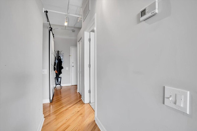500 S Clinton St Unit 527, Chicago, IL 60607 - hallway with light wood finished floors