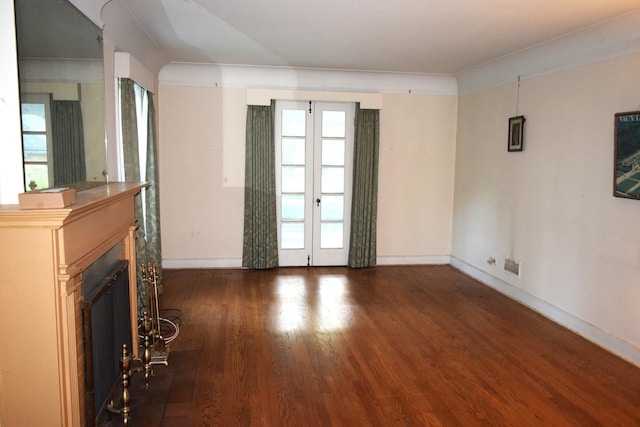 2008 Mcdaniel Ave, Evanston, IL 60201 - unfurnished living room featuring wood finished floors, a glass covered fireplace, and french doors