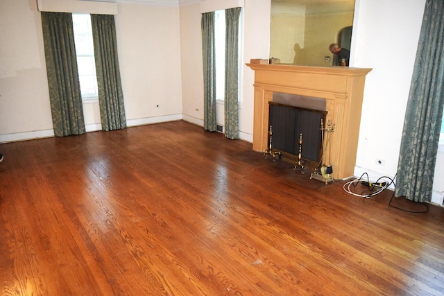 2008 Mcdaniel Ave, Evanston, IL 60201 - unfurnished living room featuring wood finished floors, a fireplace, and ornamental molding