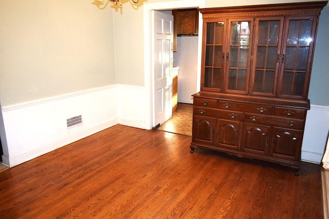 2008 Mcdaniel Ave, Evanston, IL 60201 - unfurnished dining area with a chandelier and dark wood finished floors