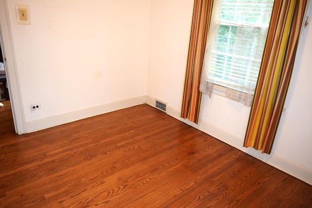 2008 Mcdaniel Ave, Evanston, IL 60201 - spare room with dark wood-style floors and baseboards