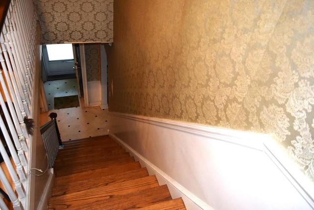 2008 Mcdaniel Ave, Evanston, IL 60201 - stairway with wallpapered walls and a wainscoted wall