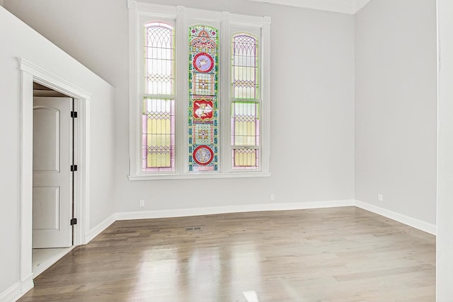 200 W Crawford St, Peotone, IL 60468 - empty room featuring wood finished floors and baseboards