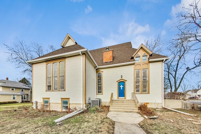 200 W Crawford St, Peotone, IL 60468 - view of front facade with a chimney and roof with shingles