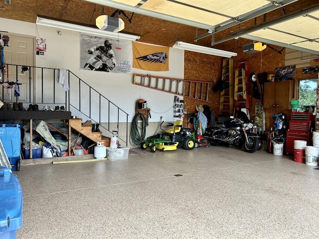 3468 E Spring Creek Dr, Ladd, IL 61329 - garage featuring a garage door opener