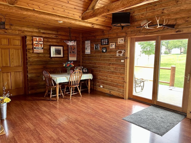3468 E Spring Creek Dr, Ladd, IL 61329 - dining space with wood finished floors, a wood ceiling with exposed beams, and log walls