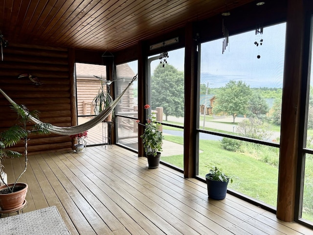3468 E Spring Creek Dr, Ladd, IL 61329 - unfurnished sunroom featuring hardwood / wood-style flooring, wood ceiling, and healthy amount of natural light