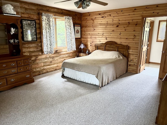 3468 E Spring Creek Dr, Ladd, IL 61329 - carpeted bedroom featuring log walls and a ceiling fan