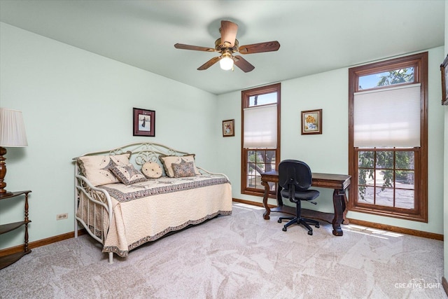 1453 Yale Ct, Naperville, IL 60565 - carpeted bedroom featuring multiple windows, a desk, and ceiling fan