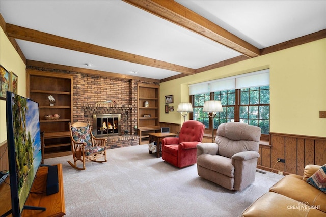 1453 Yale Ct, Naperville, IL 60565 - carpeted living room featuring wood walls, a wainscoted wall, beam ceiling, a fireplace, and built in features