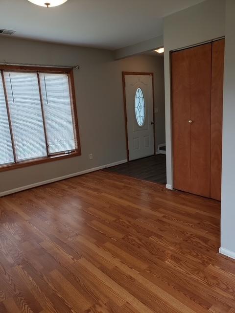 7155 W 71st St, Chicago, IL 60638 - foyer featuring light wood-style flooring