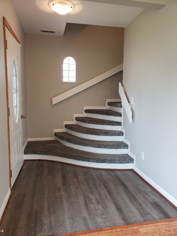 7155 W 71st St, Chicago, IL 60638 - stairs with wood finished floors and baseboards