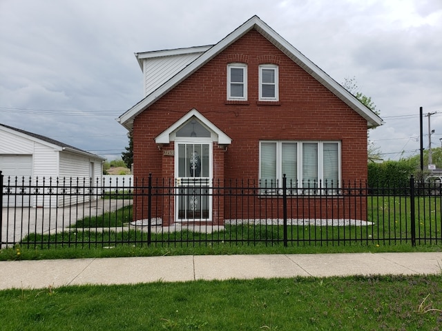 7155 W 71st St, Chicago, IL 60638 - bungalow-style house with brick siding and a fenced front yard