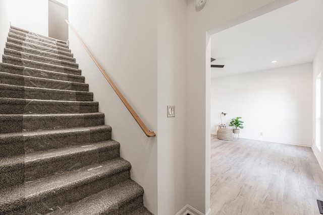 402 N St, Monroe Center, IL 61052 - stairs with wood finished floors and recessed lighting