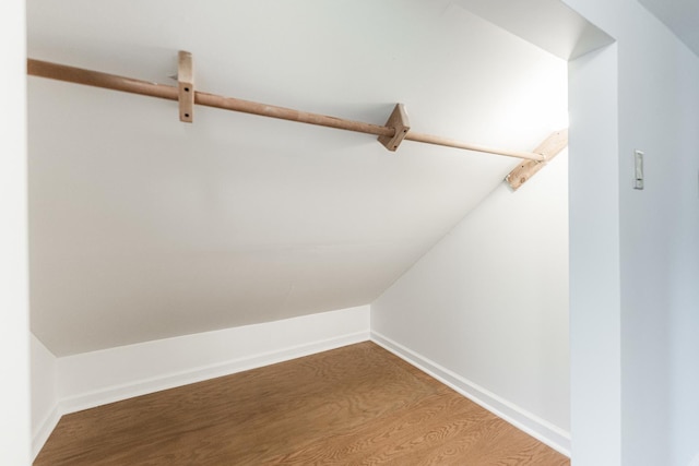 402 N St, Monroe Center, IL 61052 - walk in closet with wood finished floors and vaulted ceiling