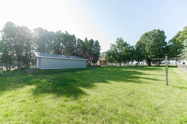 402 N St, Monroe Center, IL 61052 - view of yard with an outdoor structure and a pole building