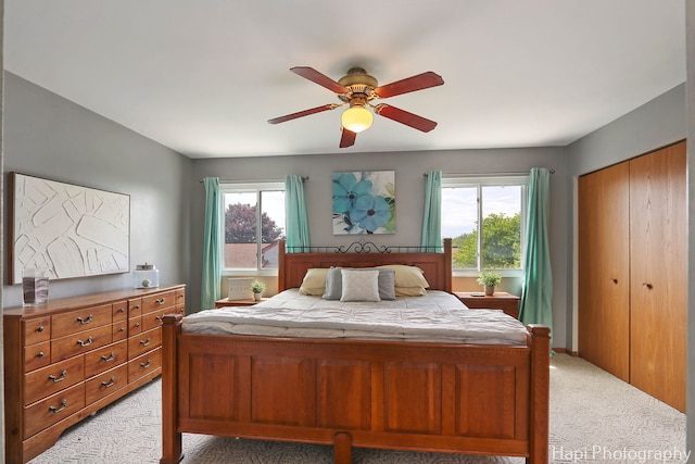 2184 N Masters Ln, Lake Villa, IL 60046 - bedroom with light colored carpet, multiple windows, and ceiling fan