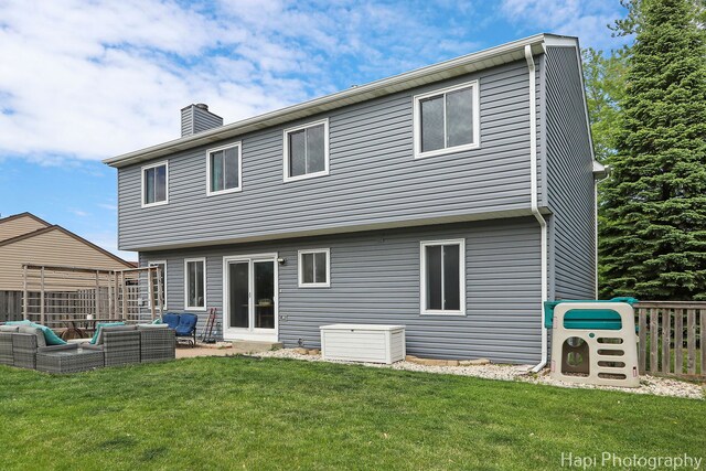 2184 N Masters Ln, Lake Villa, IL 60046 - back of house with outdoor lounge area, a chimney, and a patio area