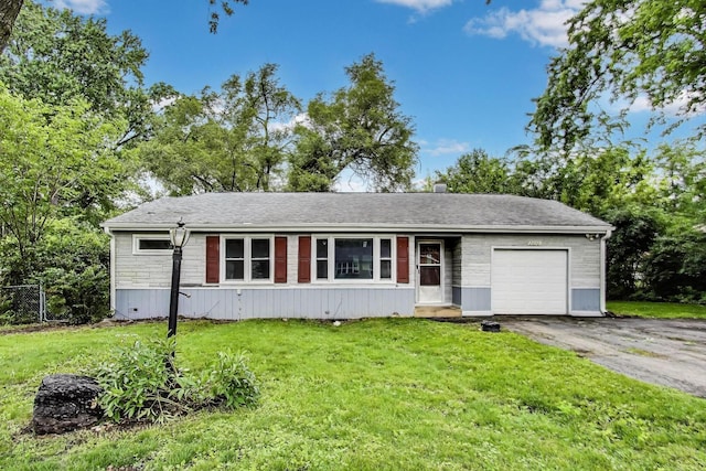 2030 Cedar Ave, Hanover Park, IL 60133 - view of front of house with a garage and asphalt driveway