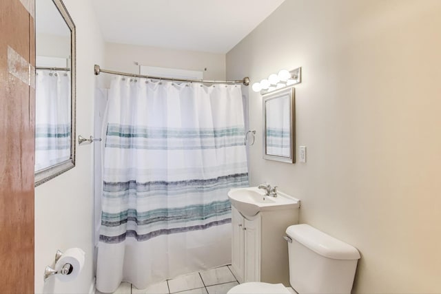 2030 Cedar Ave, Hanover Park, IL 60133 - full bathroom with vanity, a shower with curtain, and tile patterned floors