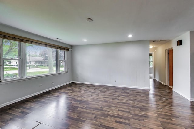 2030 Cedar Ave, Hanover Park, IL 60133 - empty room featuring dark wood-type flooring and recessed lighting