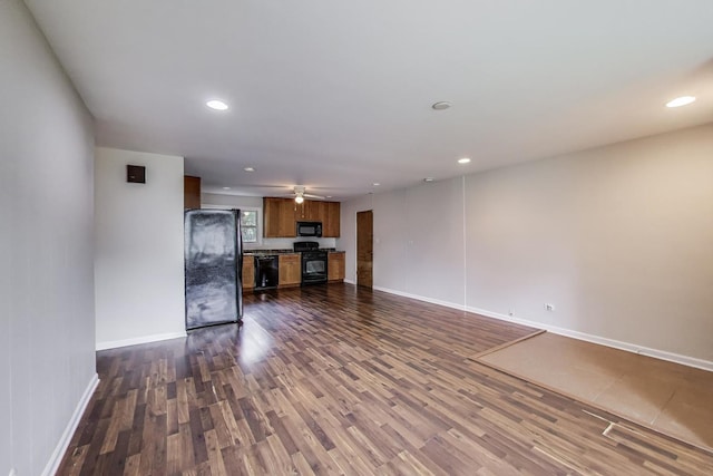 2030 Cedar Ave, Hanover Park, IL 60133 - unfurnished living room with dark wood-type flooring, ceiling fan, and recessed lighting