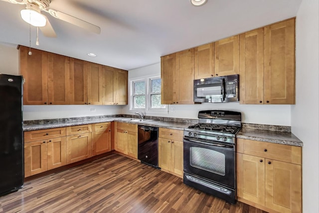 2030 Cedar Ave, Hanover Park, IL 60133 - kitchen featuring black appliances, dark countertops, dark wood-style floors, ceiling fan, and recessed lighting