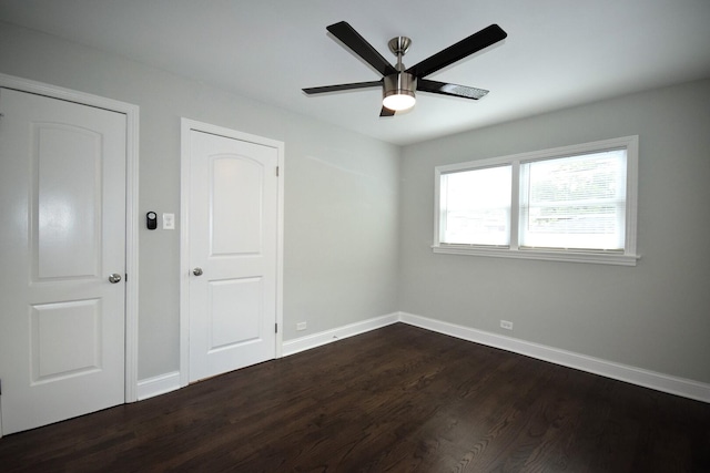 8812 S Euclid Ave, Chicago, IL 60617 - unfurnished bedroom featuring dark wood-type flooring and a ceiling fan