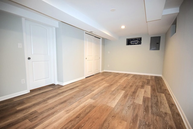 8812 S Euclid Ave, Chicago, IL 60617 - finished basement featuring electric panel, wood finished floors, and recessed lighting