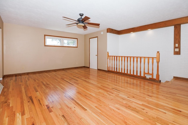 2214 E Lincoln St Unit 14, Bloomington, IL 61701 - unfurnished room with hardwood / wood-style floors and ceiling fan
