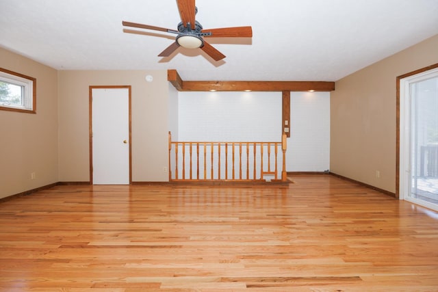 2214 E Lincoln St Unit 14, Bloomington, IL 61701 - unfurnished room featuring light wood-style floors and ceiling fan