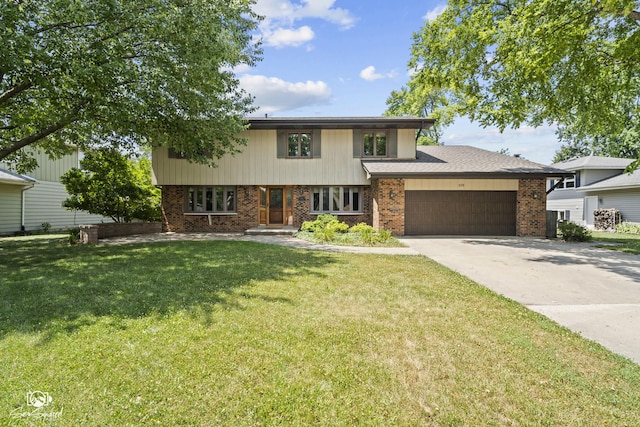 509 Apollo Dr, Joliet, IL 60435 - view of front of property featuring brick siding, an attached garage, concrete driveway, and a front lawn