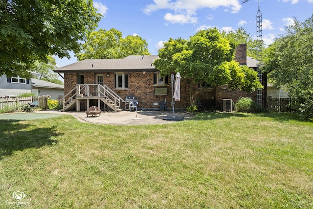 509 Apollo Dr, Joliet, IL 60435 - rear view of property with a patio area, stairway, brick siding, a chimney, and a fire pit