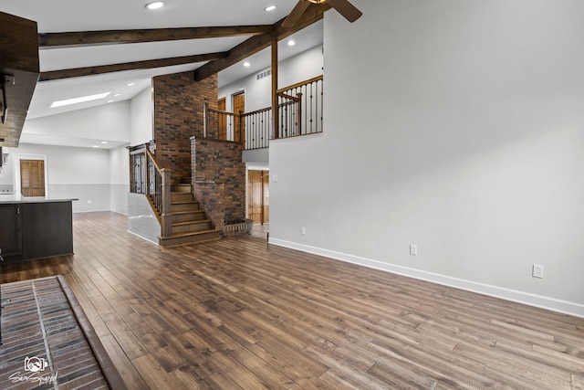 509 Apollo Dr, Joliet, IL 60435 - unfurnished living room featuring recessed lighting, stairway, ceiling fan, wood finished floors, and high vaulted ceiling