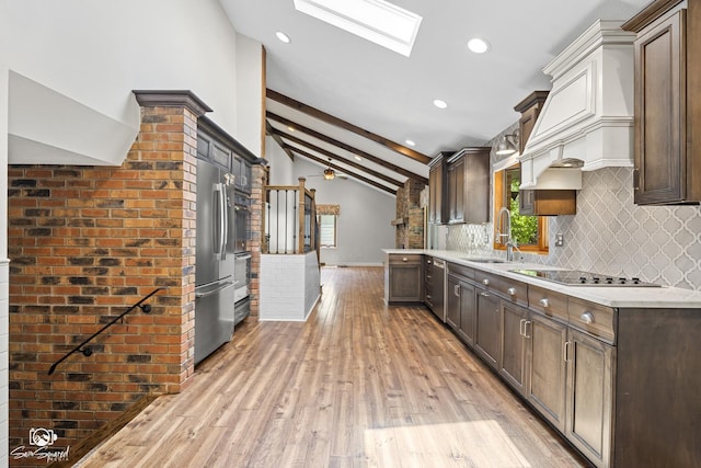 509 Apollo Dr, Joliet, IL 60435 - kitchen featuring stainless steel appliances, decorative backsplash, custom range hood, light wood-style flooring, and light countertops