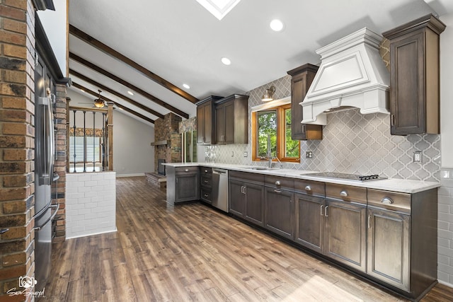 509 Apollo Dr, Joliet, IL 60435 - kitchen with dishwasher, dark brown cabinets, light countertops, dark wood-style floors, and decorative backsplash