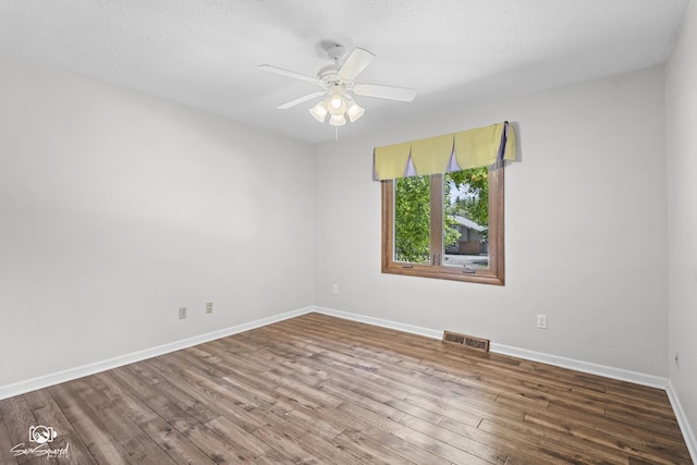 509 Apollo Dr, Joliet, IL 60435 - empty room featuring wood finished floors and a ceiling fan