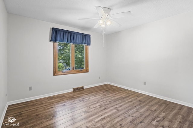 509 Apollo Dr, Joliet, IL 60435 - spare room featuring wood finished floors and ceiling fan