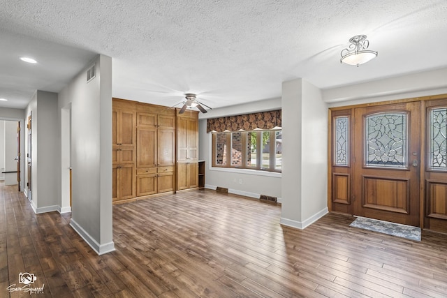 509 Apollo Dr, Joliet, IL 60435 - foyer entrance featuring dark wood-style flooring, a textured ceiling, recessed lighting, and a ceiling fan