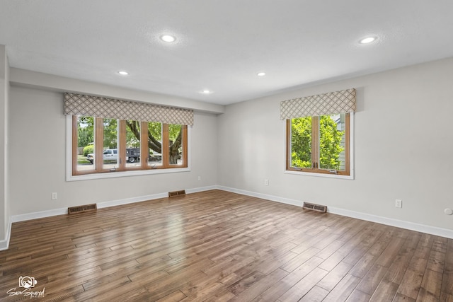 509 Apollo Dr, Joliet, IL 60435 - spare room featuring recessed lighting and wood finished floors