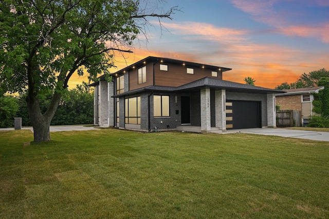 2700 Fontana Dr, Glenview, IL 60025 - contemporary home with concrete driveway, a garage, and brick siding
