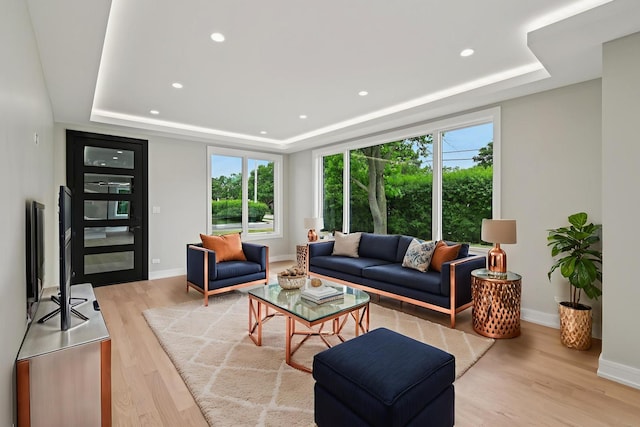 2700 Fontana Dr, Glenview, IL 60025 - living area featuring a raised ceiling, plenty of natural light, light wood-type flooring, and recessed lighting