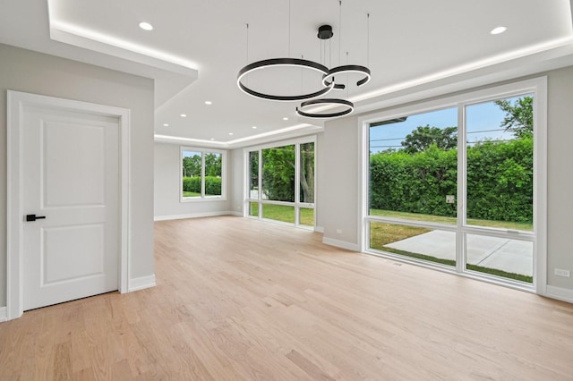 2700 Fontana Dr, Glenview, IL 60025 - empty room featuring a chandelier, light wood-style flooring, and recessed lighting