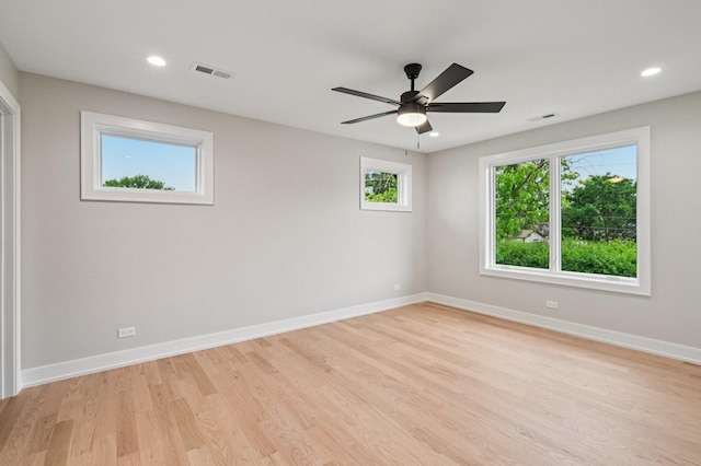 2700 Fontana Dr, Glenview, IL 60025 - empty room featuring plenty of natural light, light wood-style flooring, recessed lighting, and ceiling fan